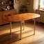 Table de salle à manger brune en bois massif ovale