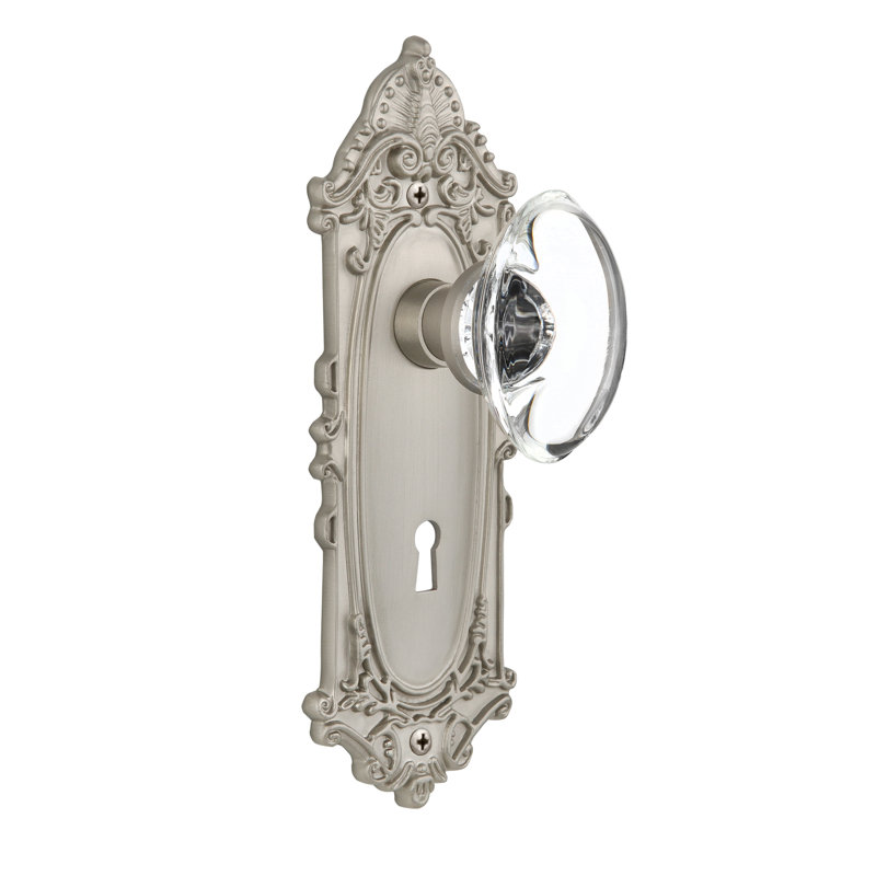 Plaque victorienne avec trou de serrure décoratif et poignée de porte ovale en cristal transparent, 2 3/8 po, Nickel satiné