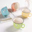 Ensemble de 4 tasses enrobées