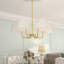 Lustre classique / traditionnel 6 lumières Vedhika Gold avec abat-jour en tissu blanc