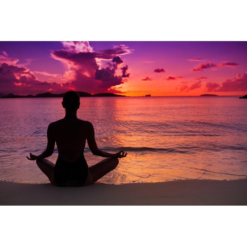 Woman Meditating In Lotus Pose On A Beach At Sunset by Cdwheatley - No Frame Print on Canvas, 30cm H x 46cm W