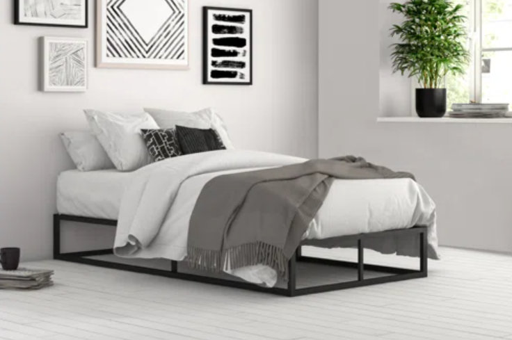 black and white metal frame low profile bed