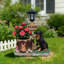 Statue de jardinière représentant une famille de rottweilers, pleine de tendresse, idéale pour la décoration extérieure et l'embellissement du jardin.