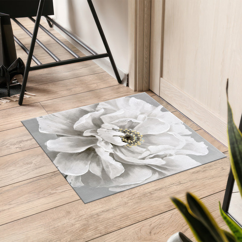 Chic tapis non tissé à motif mince avec un superbe motif floral pour une touche d'élégance dans n'importe quelle pièce de la maison