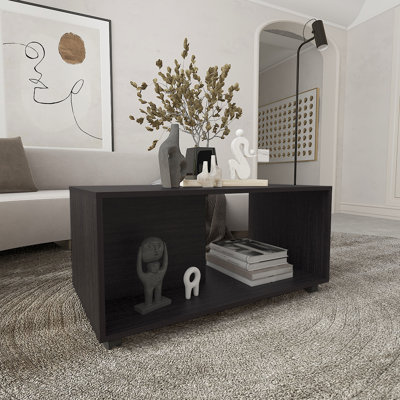 Table basse noire de 36 po de largeur, rectangulaire avec une construction stable et une tablette spacieuse pour le salon