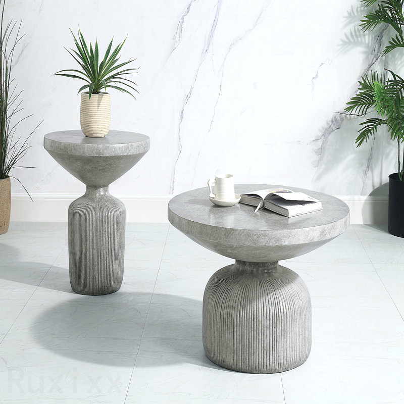 Table basse grise patinée avec plateau rond et base piédestal