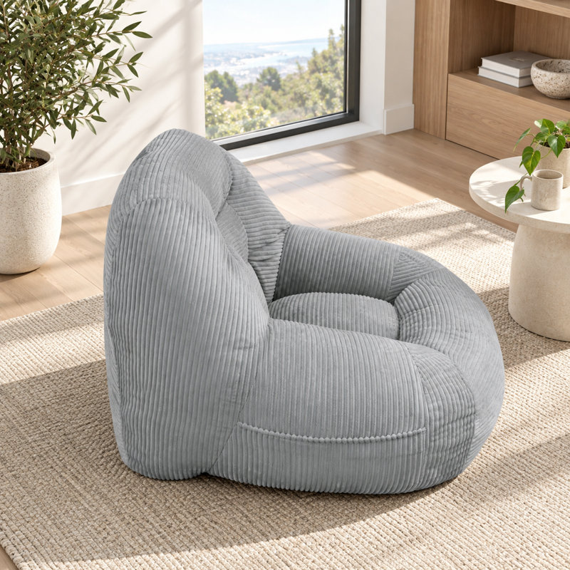 Pouf en velours côtelé gris, idéal pour une chambre d'étudiant, une chambre à coucher ou un salon.