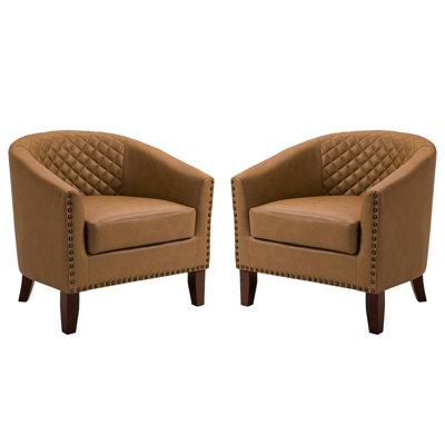 Fauteuil demi-tonneau capitonné en similicuir Edvardas