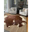 Tapis brun en cuir de vache fabriqué à la main Gorgi