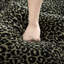 Repose-pieds en chenille léopard-960378722