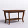 Carbin 36" Oval Coffee Table with Shelf