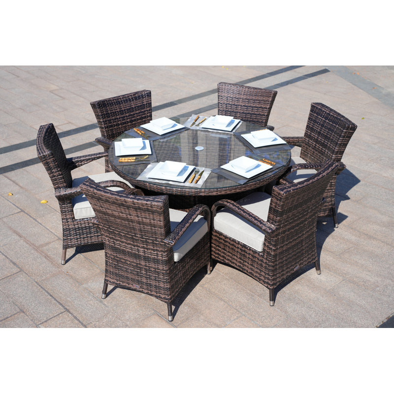 Talene 6 - Person Patio Dining Set with Round Table , Cushions Included, Brown