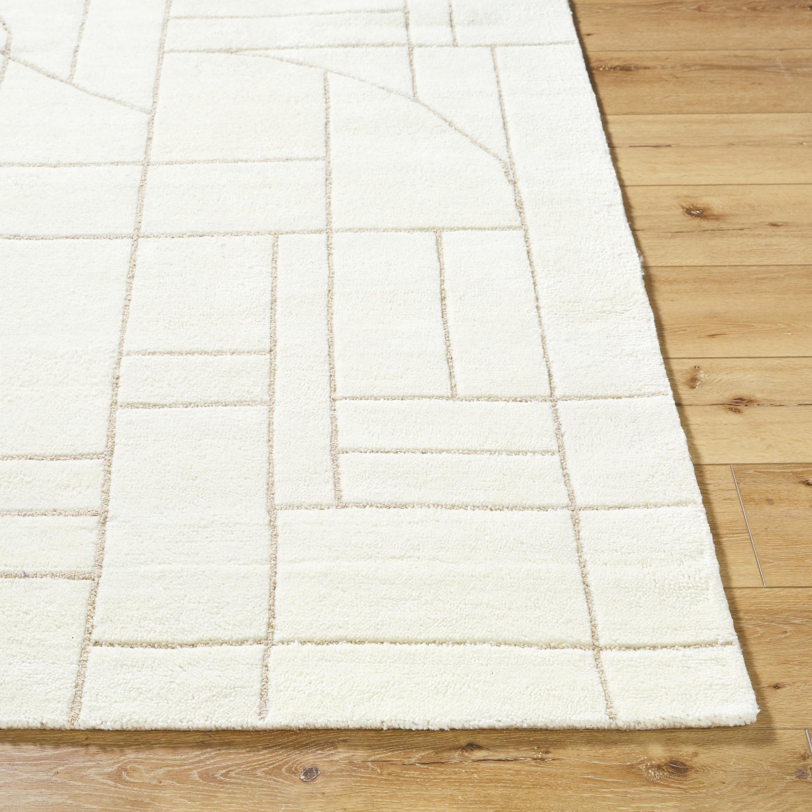 Lorette Hand Tufted Wool Cream Rug, Rectangle 5' x 7'6"