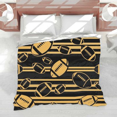 Couette rayée à motif de soccer