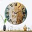 Horloge murale dorée-93382869
