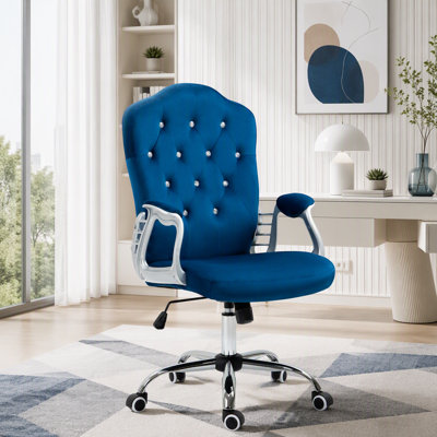 Fauteuil de bureau en velours capitonné