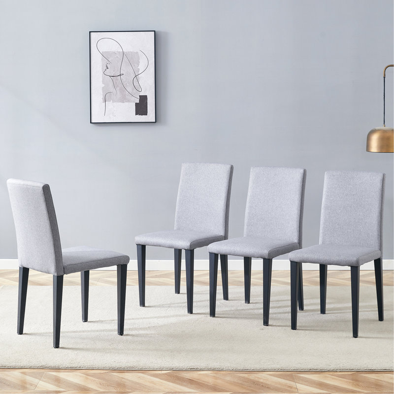 Quatre chaises de salle à manger en lin et coton gris clair, simples et polyvalentes, confortables et accompagnées. Des chaises de salle à manger exquises et polyvalentes offrent une nouvelle expérience confortable. (Ensemble de 4)