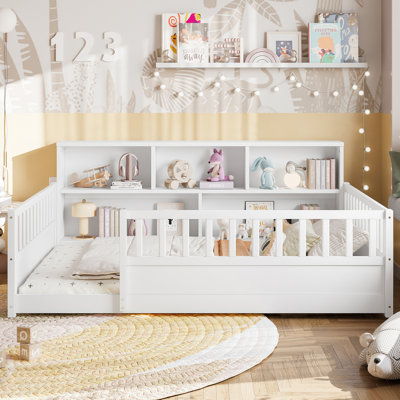 A Full-Sized Wooden Floor Bed With A Fence-Style Guardrail, Featuring A Side Storage Decorative Function, And Its Color Is White.