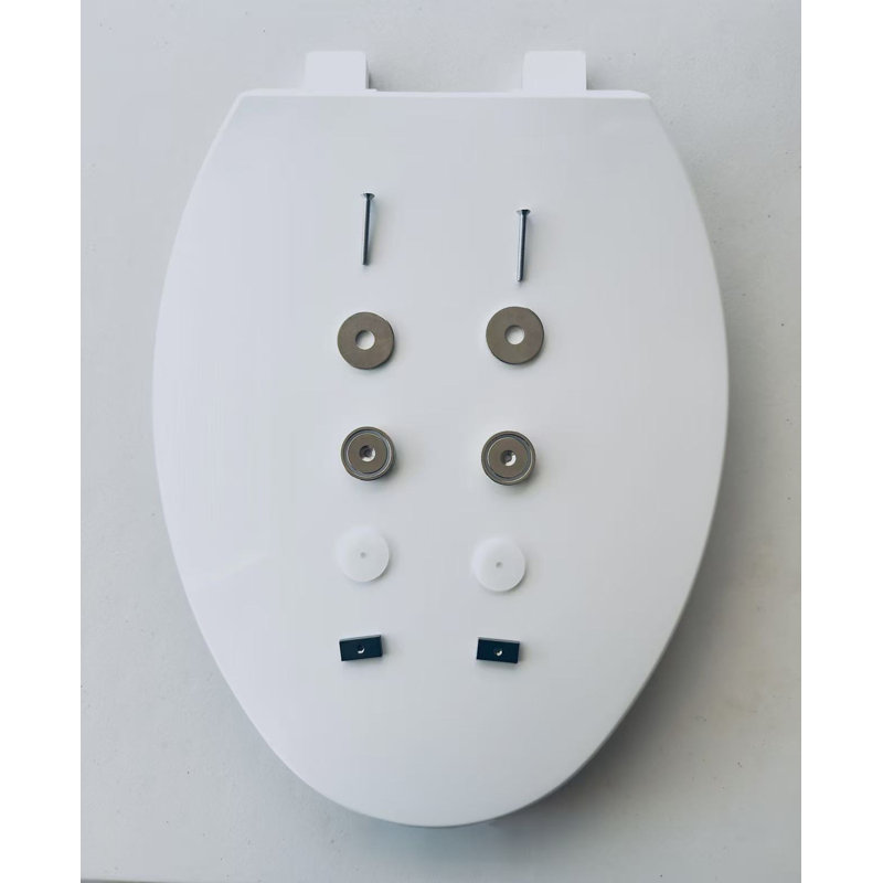 Siège de toilette allongé à dégagement rapide magnétique