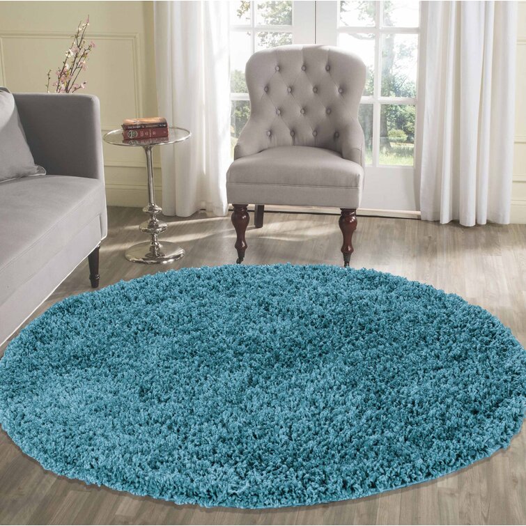 Esterly Solid Colour Machine Woven Teal Area Rug