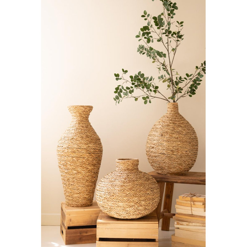 SET OF THREE TWISTED PAPER VESSELS