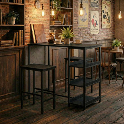 Ensemble table et chaises 3 pièces avec étagères de rangement – ​​Table de cuisine moderne et compacte avec 2 tabourets de bar – Structure en fer noir et imitation bois, idéale pour les petits espaces, siège en tube noir et imitation bois noir.