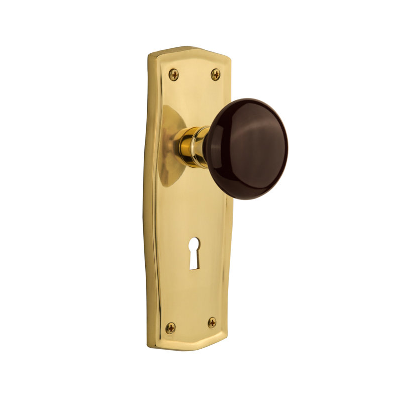 Prairie Plate with Decorative Keyhole and Brown Porcelain Door Knob, Polished Brass, 2-3/8”