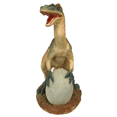 Statue dinosaure en vélociraptore oeuf battage