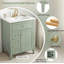 Meuble-lavabo autoportant vert clair avec lavabo en céramique, tiroirs à fermeture en douceur et armoire de rangement, pieds en bois massif