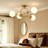 4-Light Iron Flush Mount Ceiling Light with Frosted Glass Globes