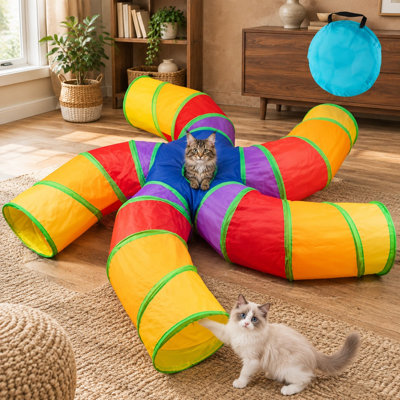 Made from Polyester, this Large 5-Way S-shaped indoor pet tunnel collapses for storage and includes an interactive peephole plus play ball for kittens, puppies, and rabbits to exercise indoors.
