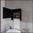 Versatile Black Medicine Cabinet With Towel Bar And Included Mirror
