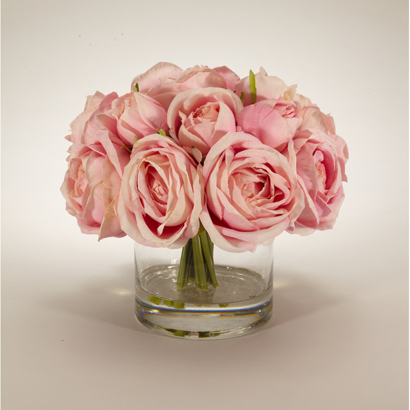 Arrangement floral rose dans un vase décoratif, Rose