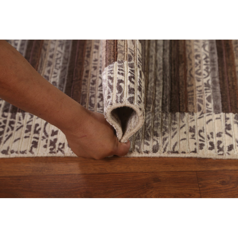 Tapis moderne rayé en laine à motif abstrait