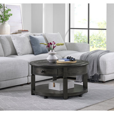 Brownstone Round Coffee Table With Storage