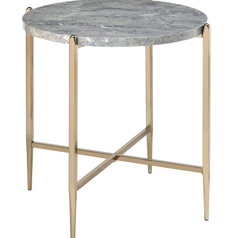 Table de salon glamour avec plateau de table en marbre gris et champagne