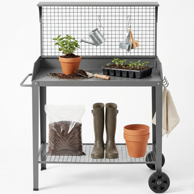 Banc de rempotage extérieur en métal avec roulettes et tablette de rangement