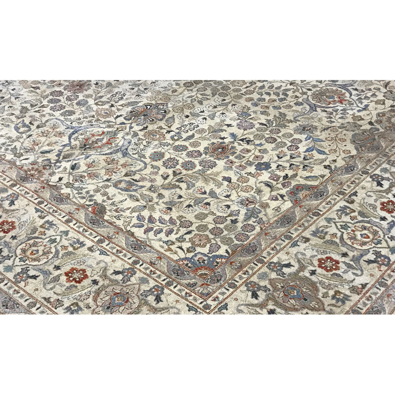 Tapis vert clair / ivoire en laine noué à la main