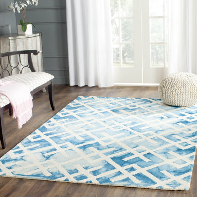 Tapis bleu / ivoire en laine / coton touffeté à la main Bryauna