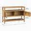 Console au fini amande grillée chaude, 2 portes en rotin naturel et grande capacité de rangement, idéale pour les intérieurs contemporains.