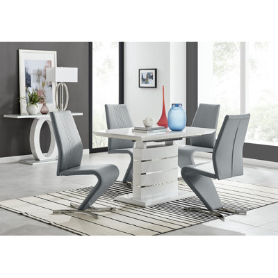 Renne Modern High Gloss Extendable Dining Table Set With 4 Modern Design Faux Leather Dining Chairs