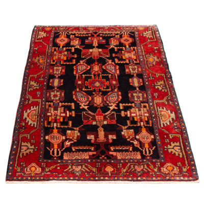 Splendid piece of work that is woven in Turkey with a re-interpretation of village Persian designs. The vintage and distressed look make this hand-knotted wool rug a natural standout.