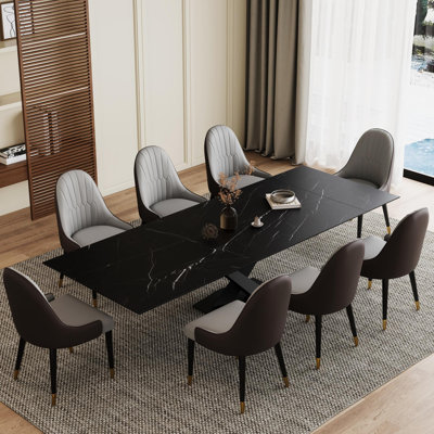 Ensemble de table de salle à manger Terrile avec plateau en pierre frittée extensible 94,5 po et 8 chaises en similicuir