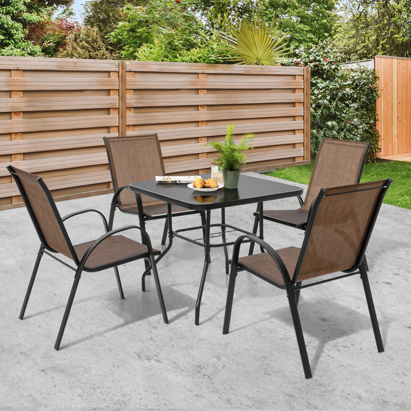 Ensemble repas 5 pièces pour l'extérieur, chaises empilables et trou pour parasol PVC-coated polyester