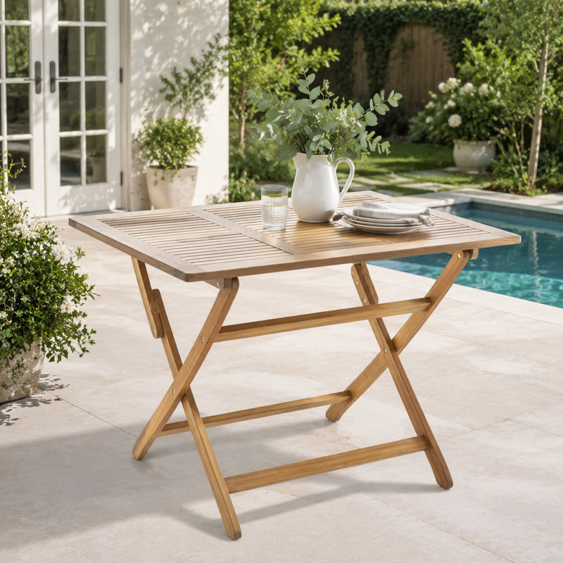 Table pliable avec un design peu encombrant pour la maison et l'extérieur
