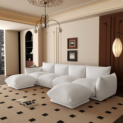 Canapé modulaire rembourré en tissu 4 places avec 2 repose-pieds Cath