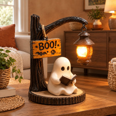 Une adorable figurine en résine 3D représentant un fantôme en train de lire donne à cette lanterne d'Halloween une douce lueur DEL, idéale pour être posée sur une table, un foyer ou une bibliothèque, et peut également servir de cadeau effrayant.