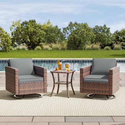 Kisner 3 Pieces Rocking Swivel Wicker Patio Chair With Cushions And Table