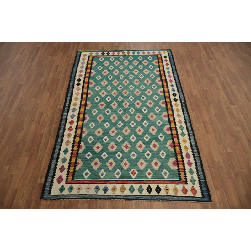 Tapis kilim vibrant vert diamant 5 x 8 pour Boho Chic Interiors