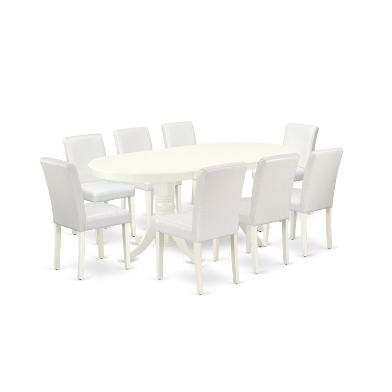 L'ensemble de salle à manger 5 pièces comprend une table de salle à manger ovale avec rallonge papillon et 4 chaises Parson revêtues de similicuir blanc, lin blanc